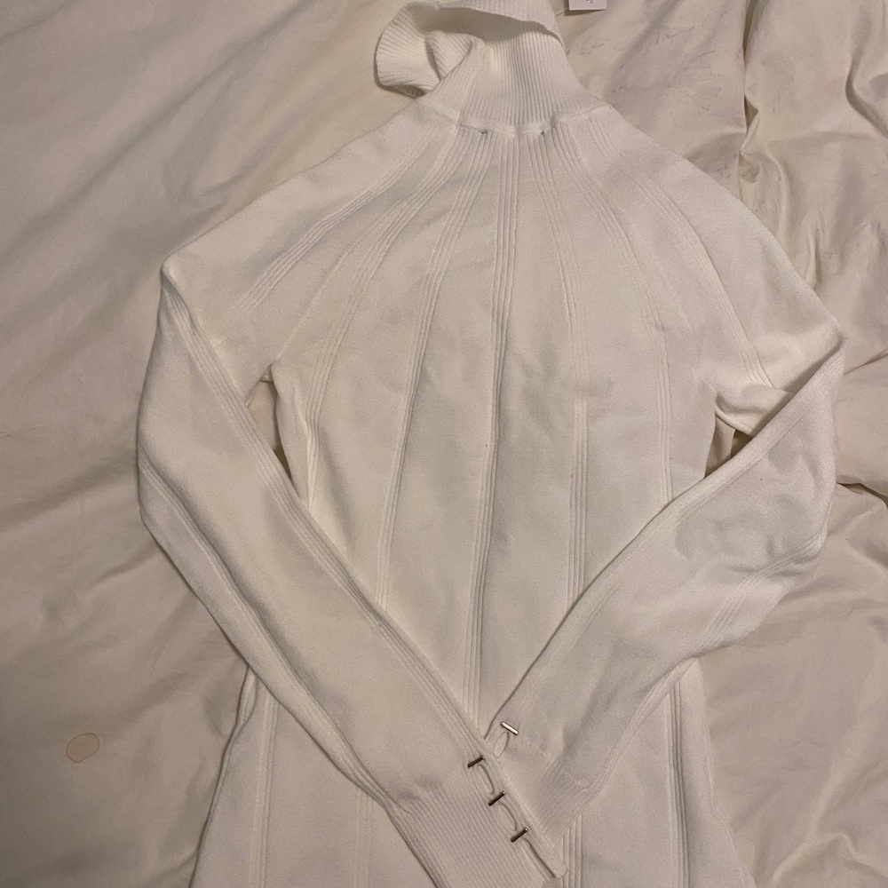 Black house white market turtleneck